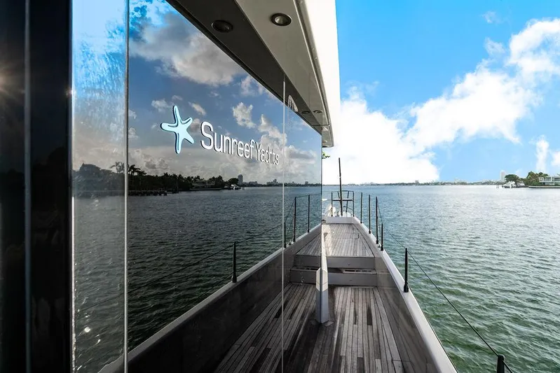 Island Majesty Yacht Photos Pics Sunreef 70 yacht deck with scenic water view, 2018 model.