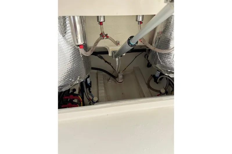  Yacht Photos Pics 2023 Cobia 301 Center Console boat interior wiring and components.