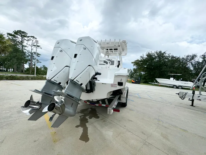  Yacht Photos Pics 2025 Fountain 34TE boat with dual outboard motors on a trailer.