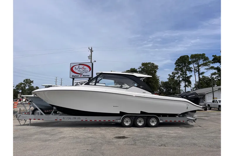  Yacht Photos Pics 2025 Fountain 39 DX boat on trailer at Marker 17 Marine dealership.