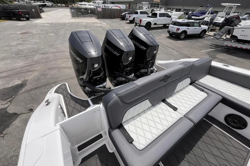  Yacht Photos Pics 2025 Fountain 39 DX boat with triple Mercury engines and luxurious seating.