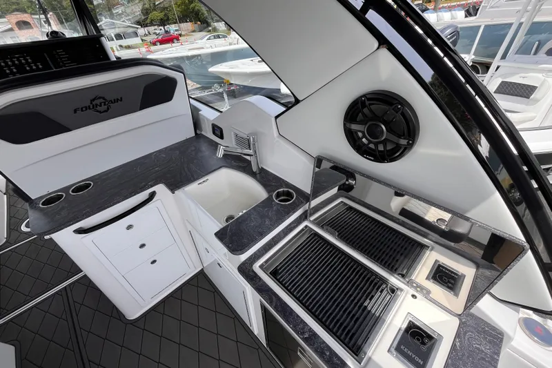  Yacht Photos Pics Luxurious 2025 Fountain 39 DX boat interior with sleek kitchen and modern amenities.