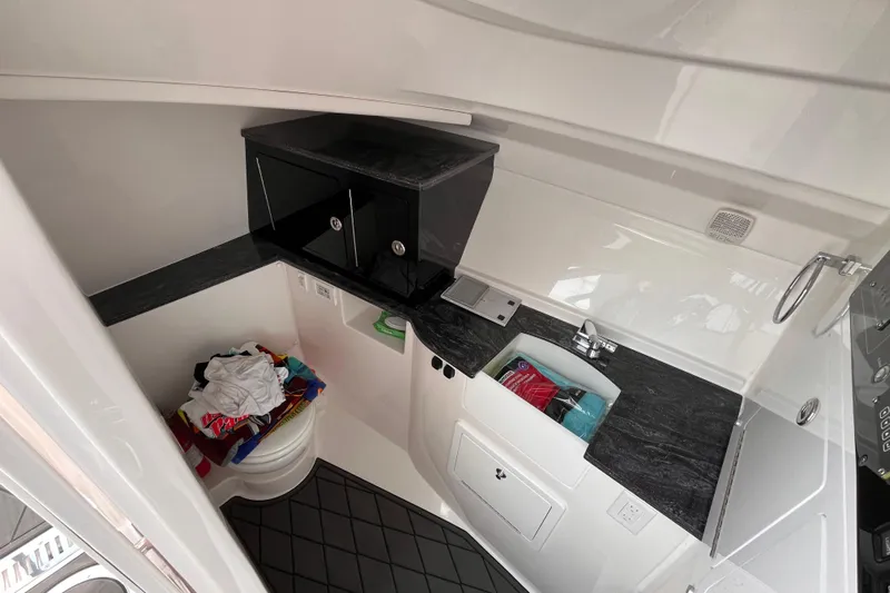  Yacht Photos Pics Interior of 2025 Fountain 39 DX boat with modern bathroom amenities.