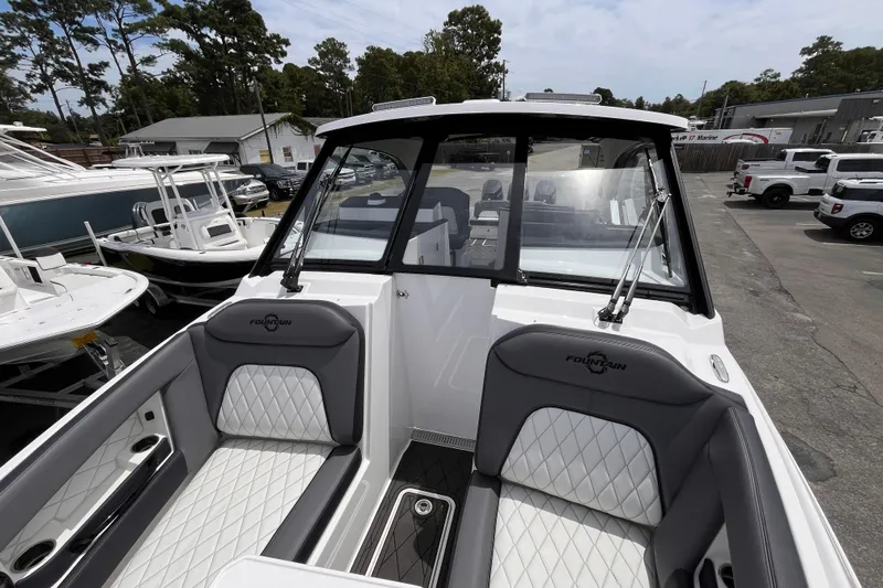  Yacht Photos Pics 2025 Fountain 39 DX boat interior with sleek seating and modern design.