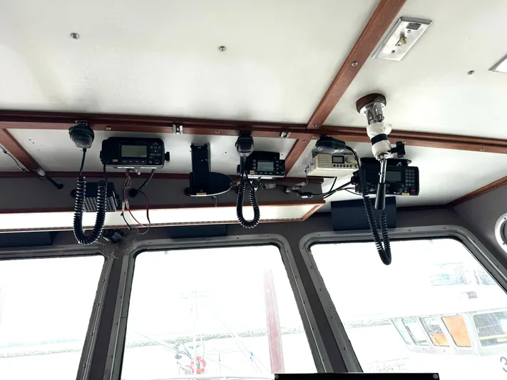 Western Shore Yacht Photos Pics Ceiling-mounted communication equipment inside a 1989 Custom Expedition Yacht.