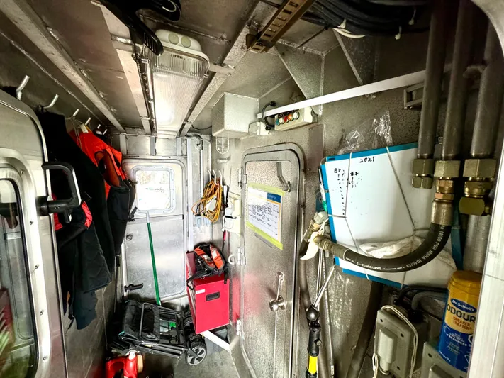 Western Shore Yacht Photos Pics Interior of a 1989 Custom Expedition Yacht, featuring equipment and storage.