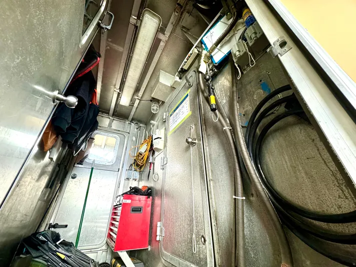 Western Shore Yacht Photos Pics Interior of 1989 Custom Expedition Yacht with tools and equipment storage.