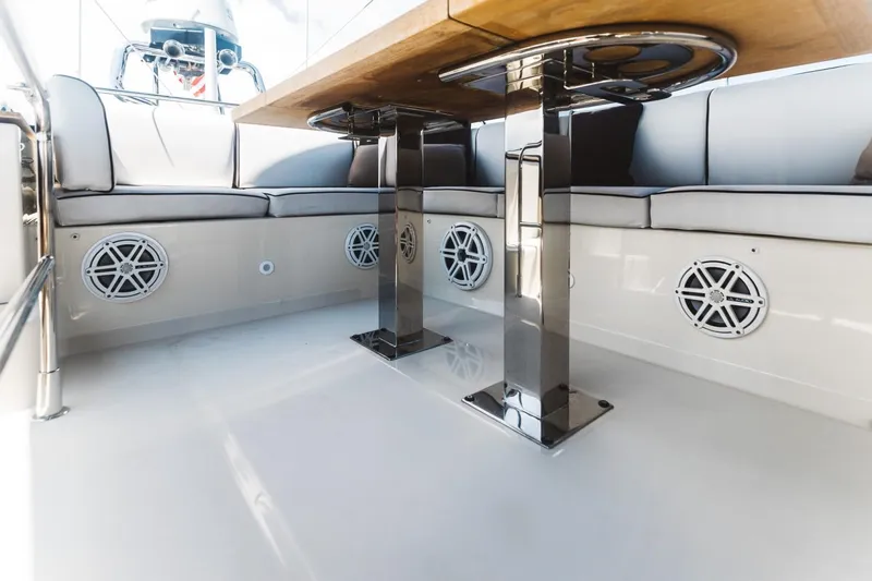  Yacht Photos Pics 2015 Beneteau Monte Carlo 5 yacht interior with sleek seating and modern table design.