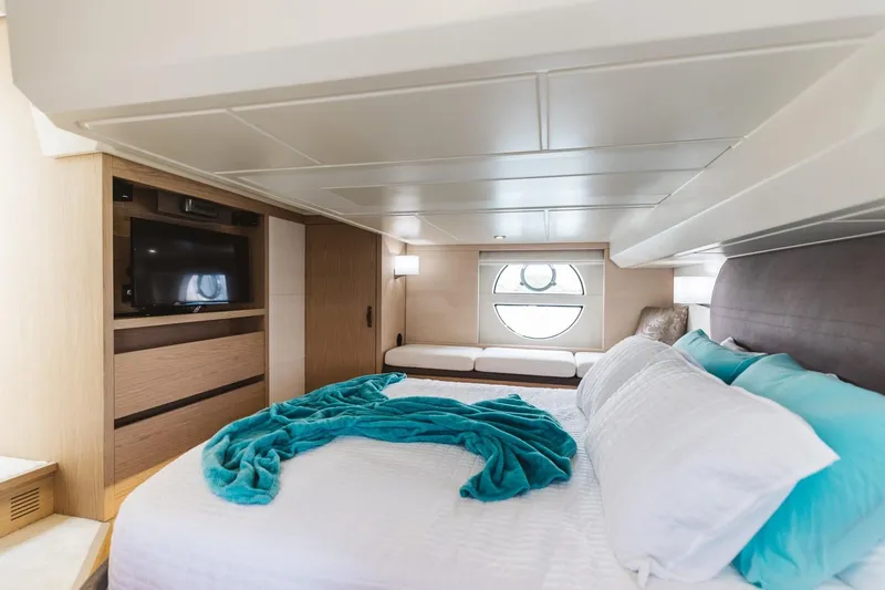  Yacht Photos Pics Luxurious bedroom in 2015 Beneteau Monte Carlo 5 yacht with modern decor.