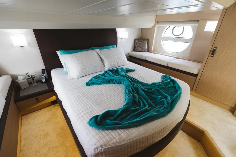  Yacht Photos Pics Luxurious bedroom in 2015 Beneteau Monte Carlo 5 yacht with elegant decor and natural light.