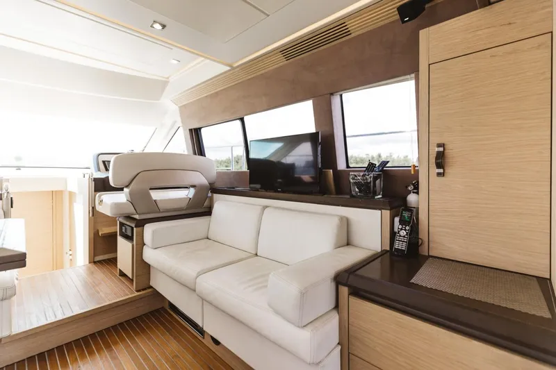  Yacht Photos Pics Luxurious interior of 2015 Beneteau Monte Carlo 5 yacht with modern furnishings.