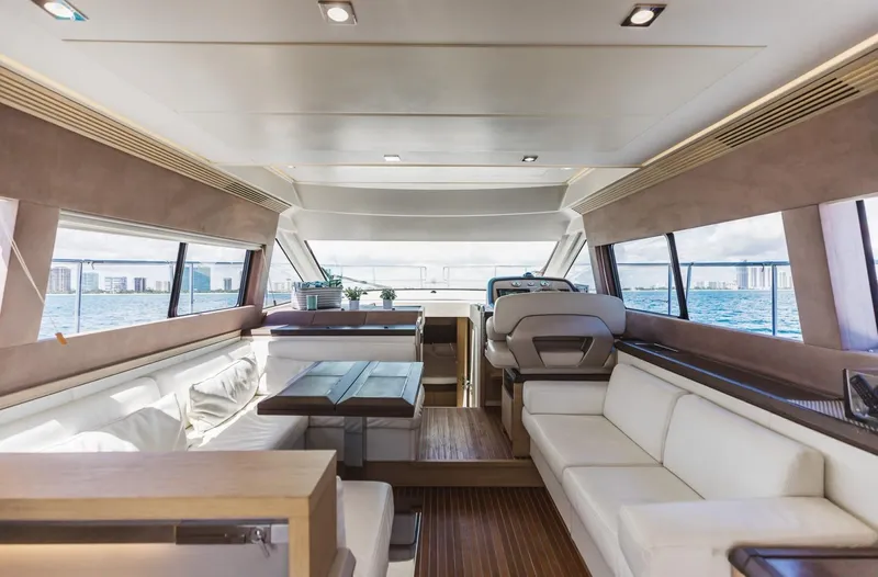  Yacht Photos Pics Luxurious interior of 2015 Beneteau Monte Carlo 5 yacht with panoramic windows.