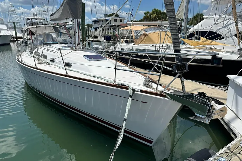 Champagne Lady Yacht Photos Pics 2007 Sabre 386 sailboat docked at marina, featuring sleek white hull and modern design.