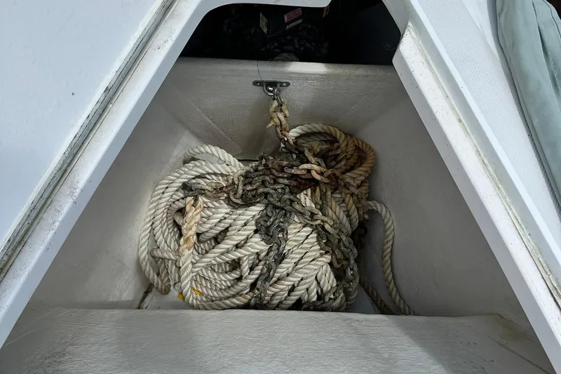 Champagne Lady Yacht Photos Pics Coiled rope and chain in a Sabre 386 sailboat's storage compartment, 2007 model.