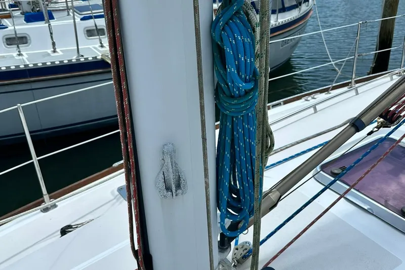 Champagne Lady Yacht Photos Pics Sailboat deck with ropes and rigging, Sabre 386, 2007 model, docked at marina.
