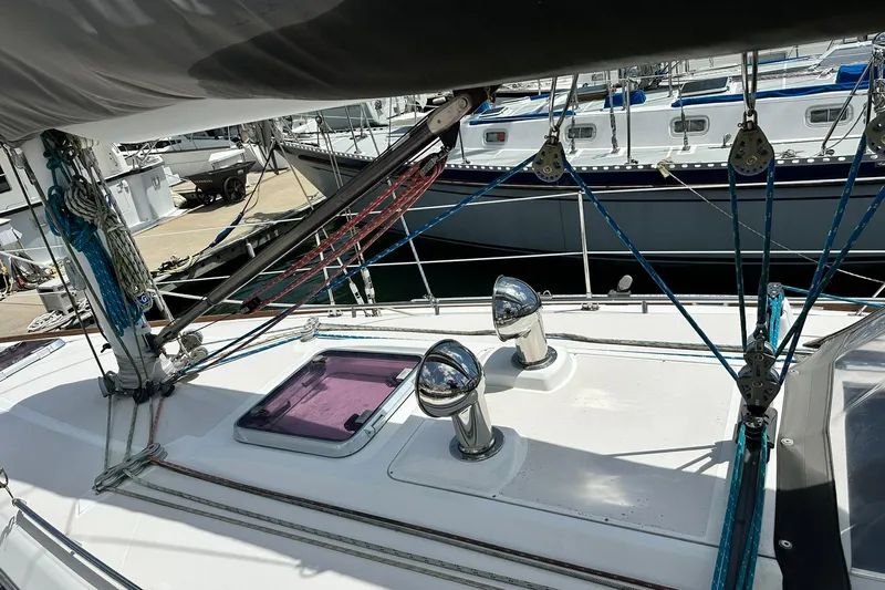 Champagne Lady Yacht Photos Pics Sailboat deck with rigging and chrome vents, Sabre 386, 2007 model, docked at marina.