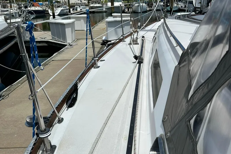 Champagne Lady Yacht Photos Pics 2007 Sabre 386 sailboat docked, showcasing deck and rigging details.