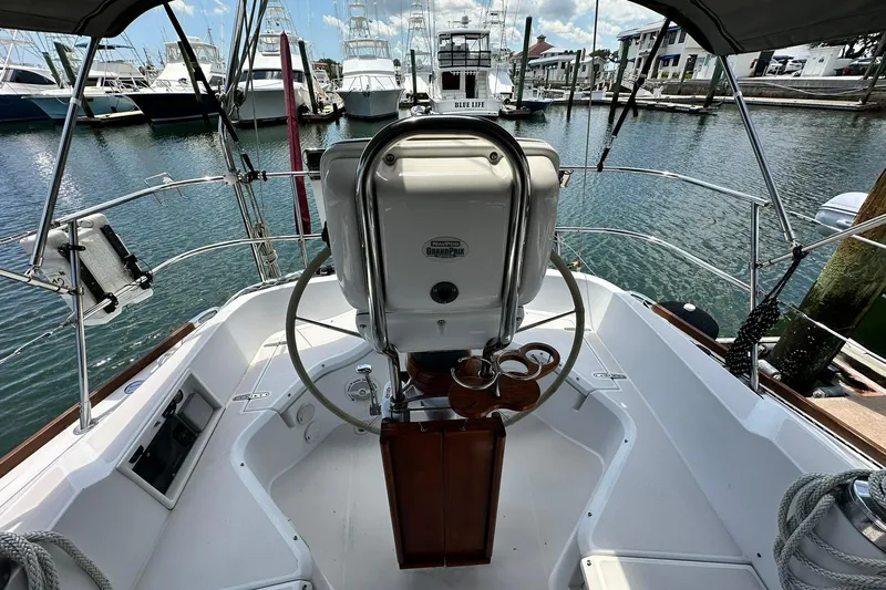 Champagne Lady Yacht Photos Pics Cockpit view of 2007 Sabre 386 sailboat docked in a marina.