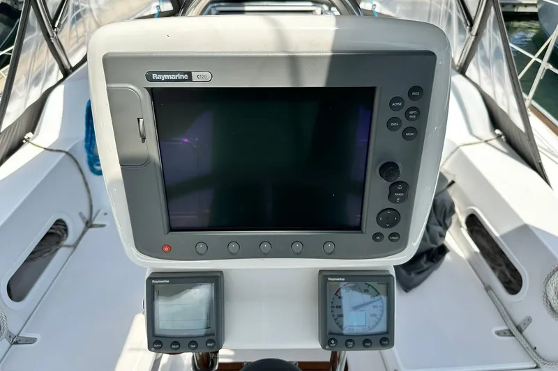 Champagne Lady Yacht Photos Pics Cockpit of 2007 Sabre 386 sailboat with Raymarine navigation equipment.