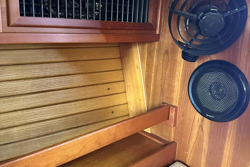 Champagne Lady Yacht Photos Pics Interior of 2007 Sabre 386 with wood paneling and Sony speaker.