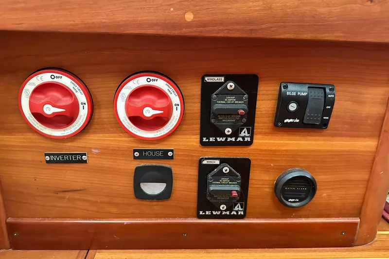 Champagne Lady Yacht Photos Pics Control panel of a 2007 Sabre 386 yacht with switches and circuit breakers.