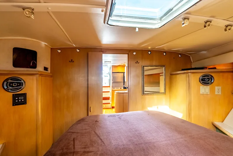 Magic Yacht Photos Pics 1992 Tiara Yachts 4300 Open cabin interior with skylight and wooden finishes.