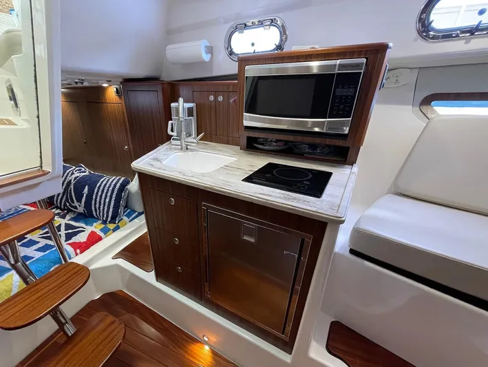 False Echoes Yacht Photos Pics Pursuit 32 False Echoes- Galley