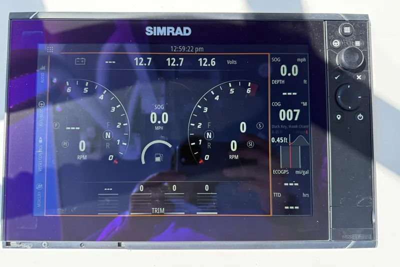  Yacht Photos Pics Simrad display on 2023 Invincible 46 Catamaran showing navigation and engine data.