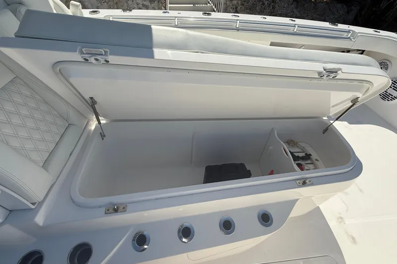 Yacht Photos Pics Open storage compartment on 2023 Invincible 46 Catamaran, featuring sleek design and ample space.