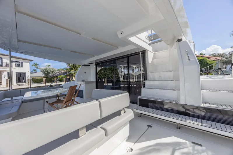  Yacht Photos Pics 2024 Leopard 53 Powercat yacht interior with modern seating and sleek design.