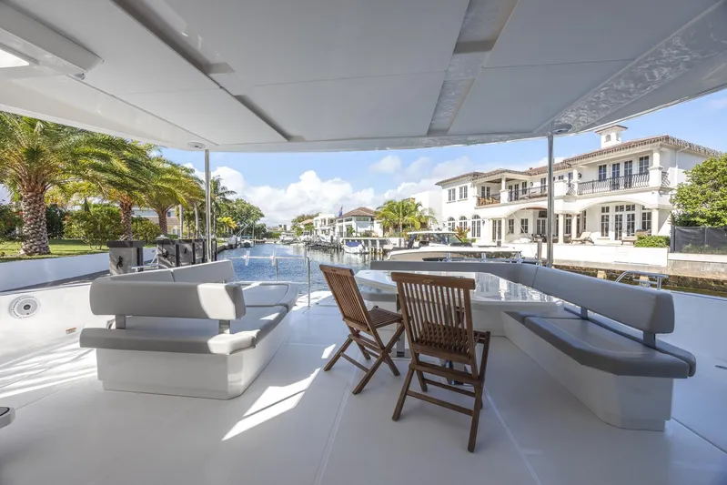  Yacht Photos Pics Luxurious 2024 Leopard 53 Powercat yacht with spacious deck and waterfront view.