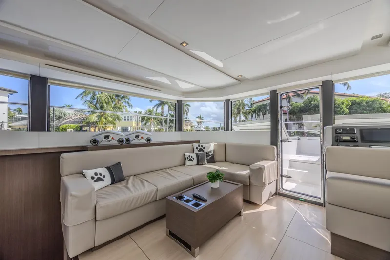  Yacht Photos Pics Luxurious interior of 2024 Leopard 53 Powercat yacht with modern seating and panoramic windows.