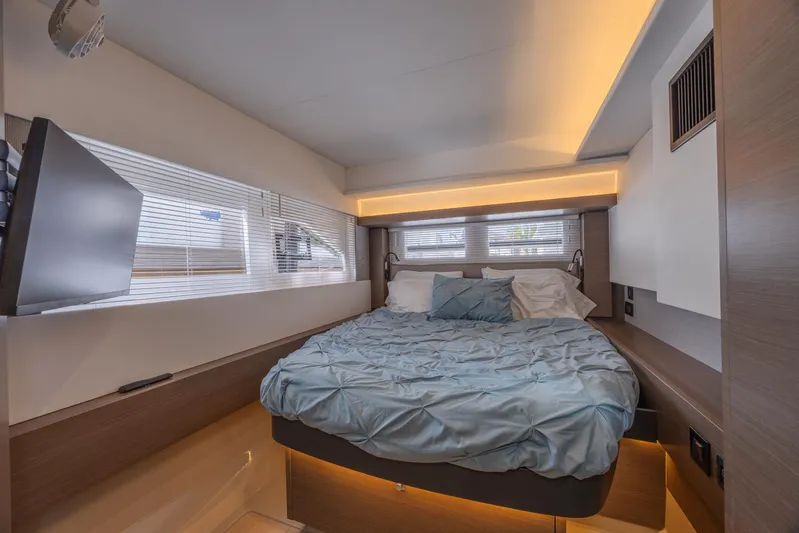  Yacht Photos Pics Luxurious bedroom interior of 2024 Leopard 53 Powercat yacht with modern design.