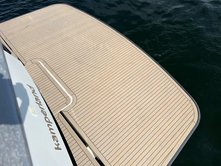  Yacht Photos Pics Teak deck of 2013 Vripack Utopia 58 yacht on water.