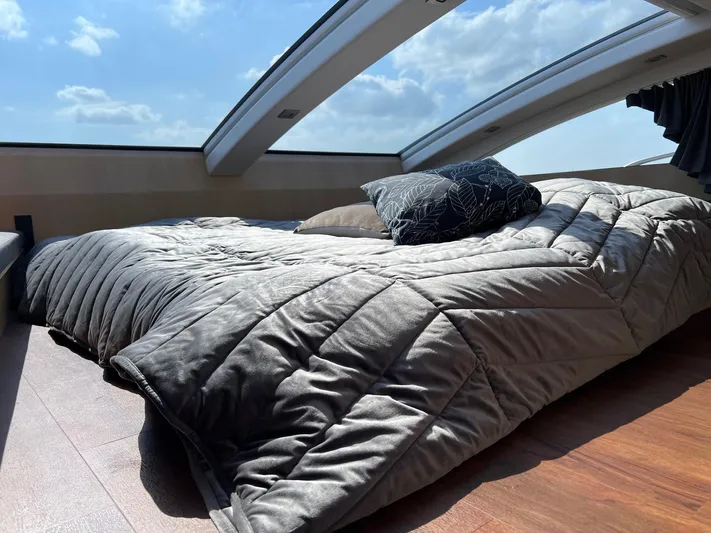  Yacht Photos Pics Luxurious Vripack Utopia 58 yacht interior with skylight and cozy bedding, 2013 model.