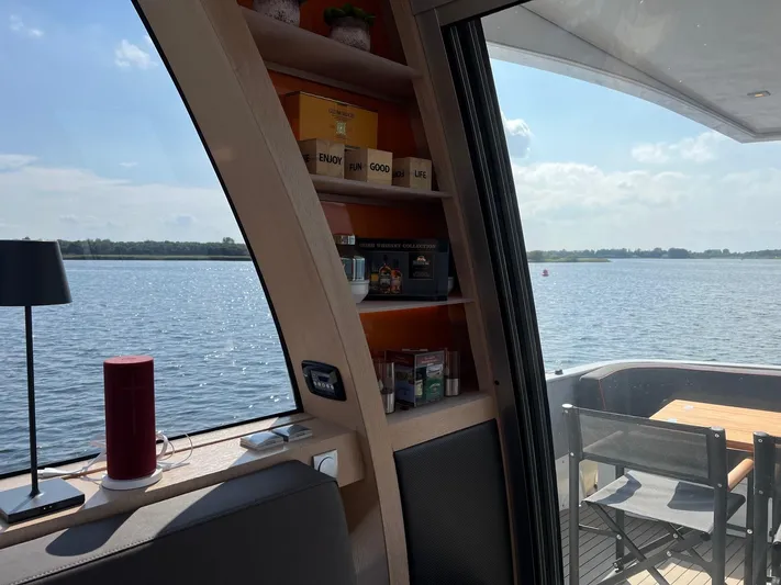  Yacht Photos Pics Interior view of 2013 Vripack Utopia 58 yacht with lake scenery.