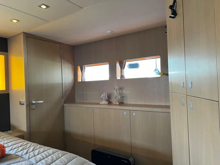  Yacht Photos Pics Luxurious interior of 2013 Vripack Utopia 58 yacht with modern wood cabinetry.