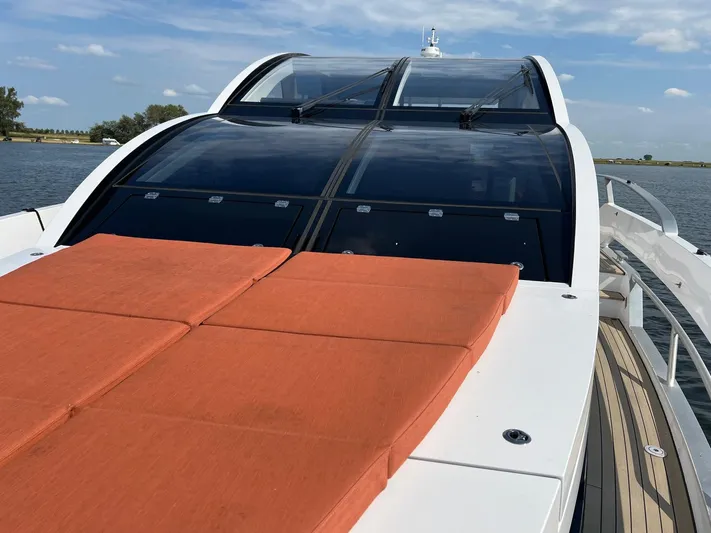  Yacht Photos Pics Luxury Vripack Utopia 58 yacht with sun deck, sleek design, and panoramic windows, 2013 model.