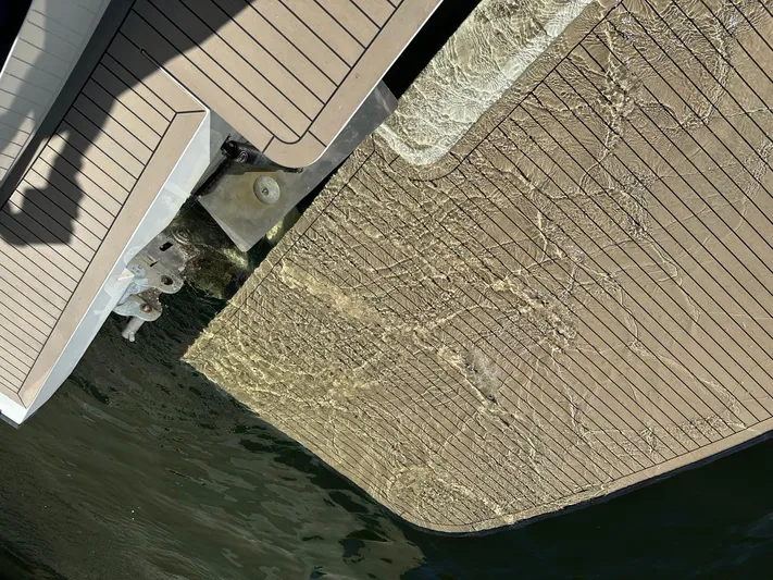  Yacht Photos Pics Dockside view of Vripack Utopia 58 yacht, 2013 model, with textured decking.