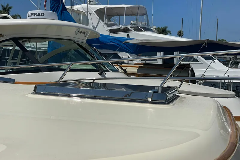 White Sauce Yacht Photos Pics 2017 Hinckley Talaria 43 Motoryacht with sleek design and modern features docked at marina.