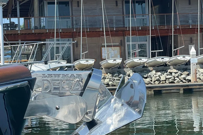 White Sauce Yacht Photos Pics Hinckley Talaria 43 Motoryacht 2017 with Lewmar Delta anchor at marina.