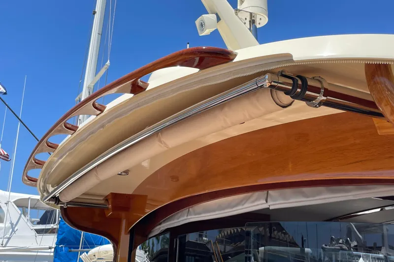 White Sauce Yacht Photos Pics Hinckley Talaria 43 Motoryacht 2017, showcasing elegant woodwork and polished metal details.