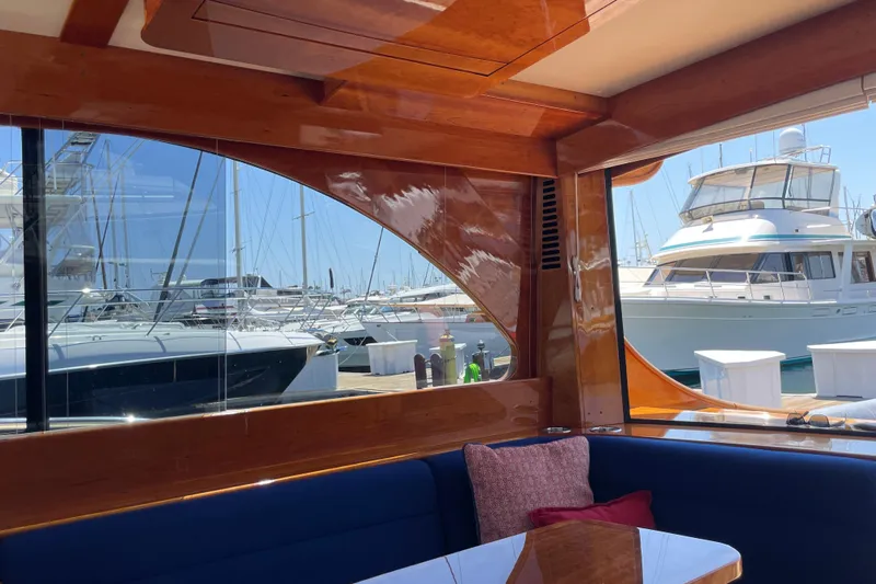 White Sauce Yacht Photos Pics Interior view of 2017 Hinckley Talaria 43 Motoryacht with marina backdrop.