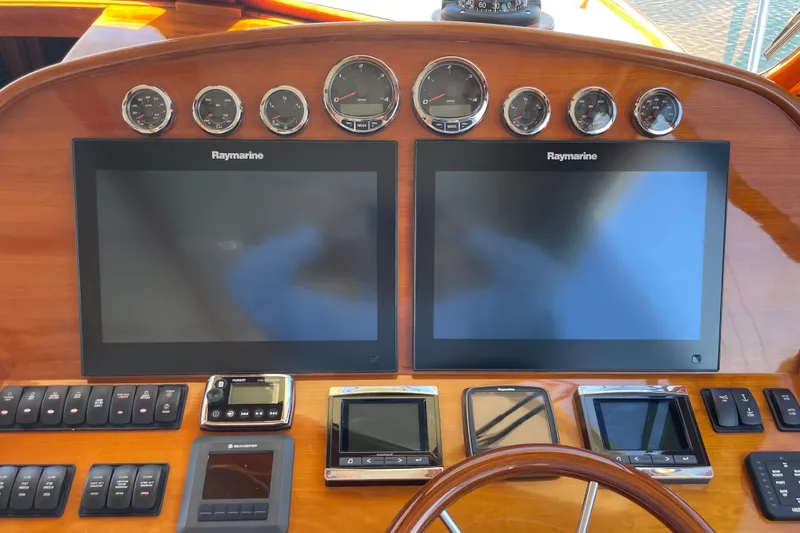White Sauce Yacht Photos Pics Hinckley Talaria 43 Motoryacht 2017 dashboard with Raymarine displays and control panels.