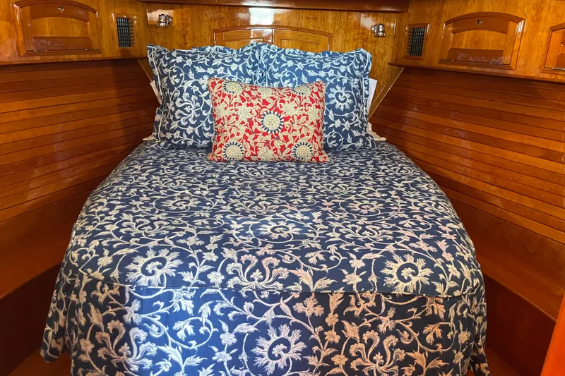 White Sauce Yacht Photos Pics Luxurious cabin interior of 2017 Hinckley Talaria 43 Motoryacht with elegant bedding.