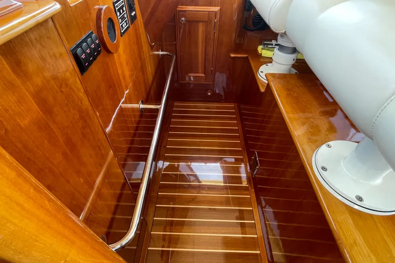 White Sauce Yacht Photos Pics Luxurious interior of 2017 Hinckley Talaria 43 Motoryacht with polished wood finish.