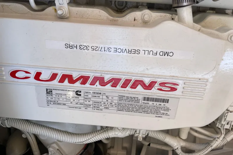 White Sauce Yacht Photos Pics Engine compartment of 2017 Hinckley Talaria 43 Motoryacht with Cummins branding.