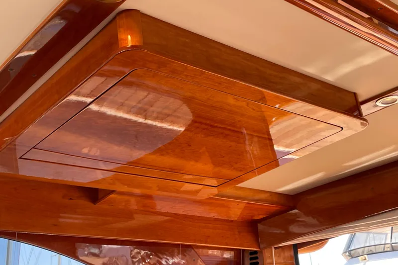 White Sauce Yacht Photos Pics Polished wood interior of 2017 Hinckley Talaria 43 Motoryacht ceiling detail.