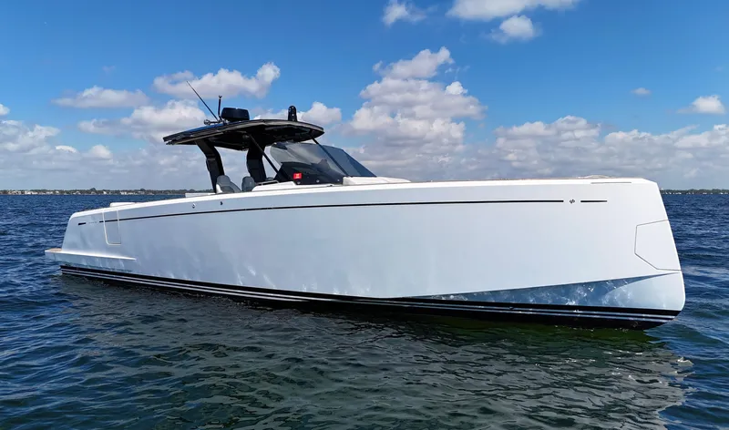  Yacht Photos Pics 2020 Pardo Yachts 38 cruising on open water under a clear blue sky.