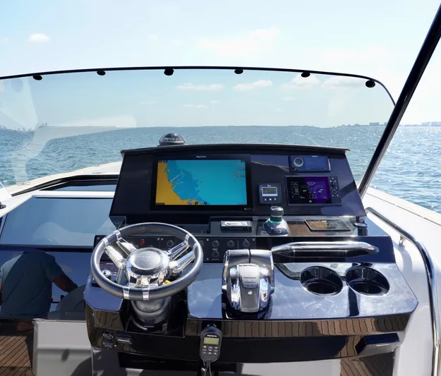  Yacht Photos Pics Helm of 2020 Pardo Yachts 38 with navigation display, steering wheel, and controls.